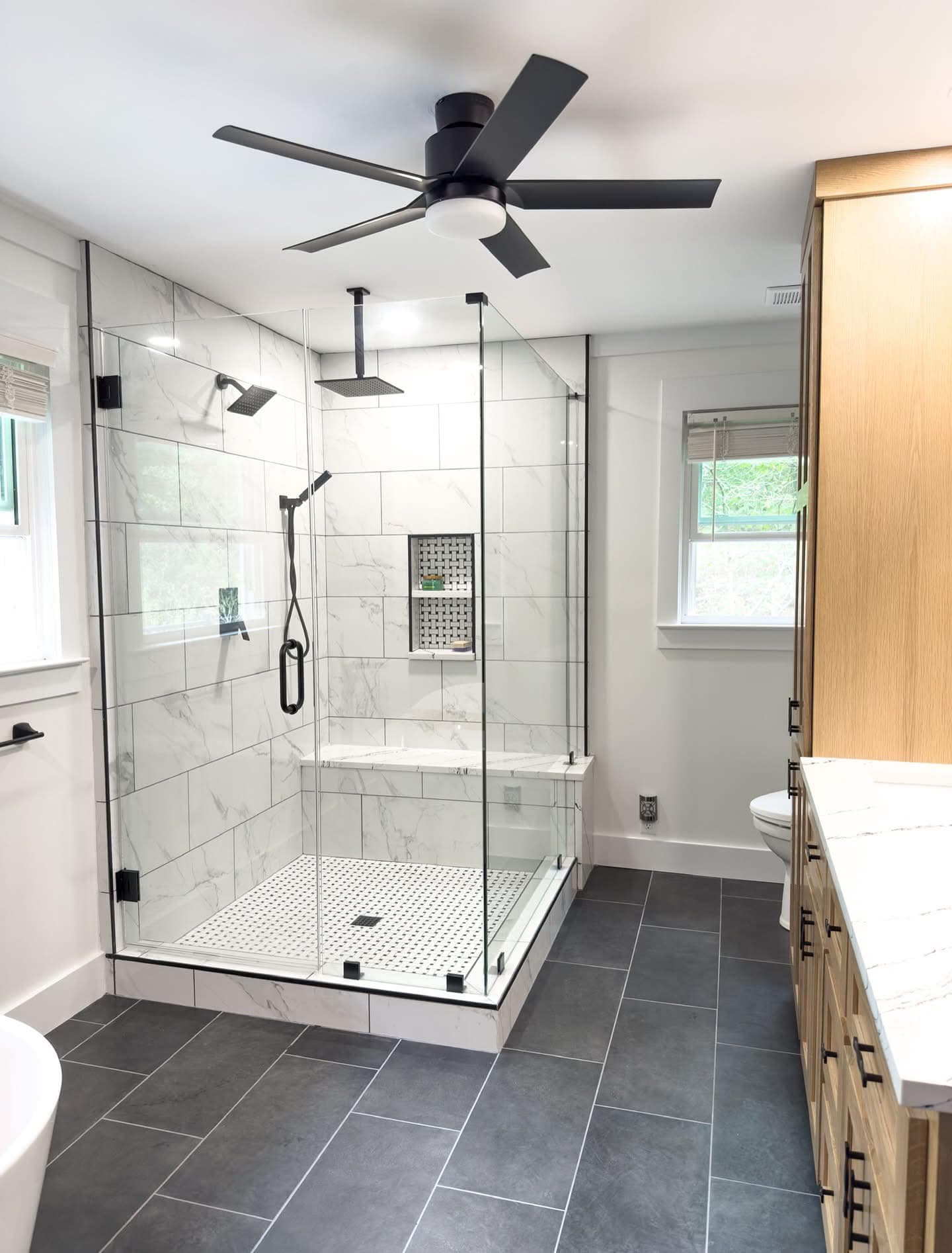 Master bath with floor-to-ceiling marble shower